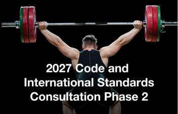 2027 Code and International Standards Consultation Phase 2. Background image is a weightlifter with weight above his head. 